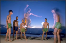 Chinlone players at dusk